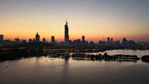 Drone view of Nanjing skyline and Xuanwu Lake at sunset Stock Footage 340216706