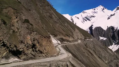 Drone view of narrow roads hugging the mountain face at Zojila. Stock Footage 310806679