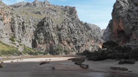 Drone view of natural beach surrounded by mountains Stock Footage 126911557