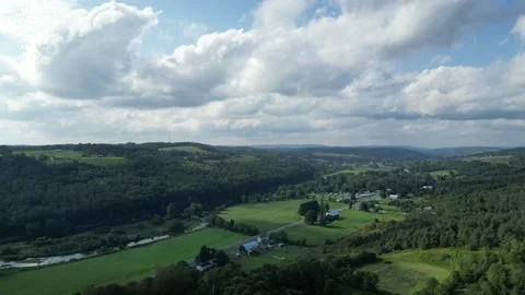 Drone view of the natural, elevated road, traffic junctions, and green garden. Stock Footage 251493645