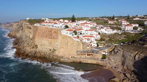 Drone view of a natural pool in the ocean, next to a cliff on the seaside Stock Footage 180419169