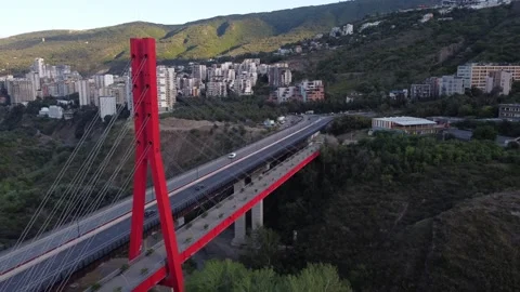 Drone view of a new bridge connecting a mountainous region to the city 動画素材 281669642