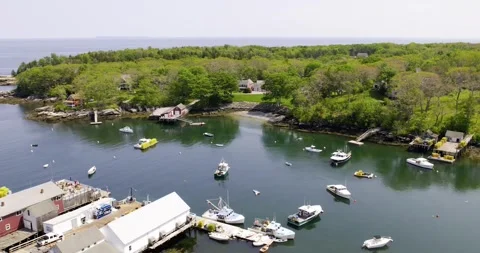 Drone view of New Harbor's working waterfront in Bristol, Maine Stock Footage 345309685