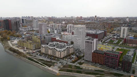 Drone view of new modern high-rise residential complex near Ob river in autumn Stock Footage 254501079