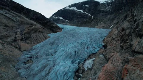 Drone View of Nigardsbreen Glacier Norway With Signs Of Melting Ice Stock Footage 339132665