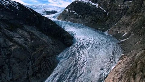 Drone View of Nigardsbreen Glacier Norway With Signs Of Melting Ice Stock Footage 339134647