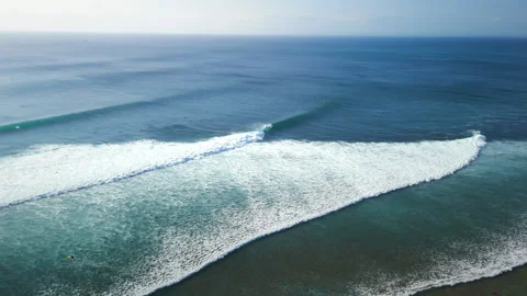 Drone view with ocean waves in ocean on Impossibles beach, perfect surfing swell 動画素材 343384560