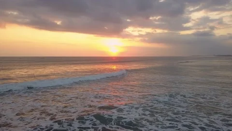 Drone view of ocean waves at sunset light aerial footage. Sunset wavy seascape 動画素材 221085182