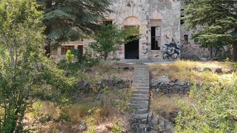 Drone view of old abandoned mansion in the forest Stock Footage 87920828
