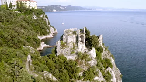 Drone view of the old duino's castle near to the sea in trieste 스톡 동영상 263603868