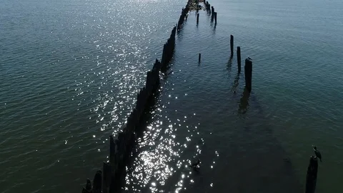 Drone view of an old mole made from wood and stones Stock Footage 105294427