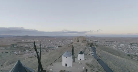 Drone view of old windmills and a castle in Toledo, Spain Stock Footage 111835054