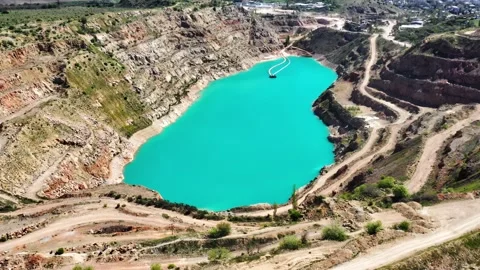 Drone view of open cast mine. Earthmoving work in open pit mining. Turquoise Vidéo 153867664