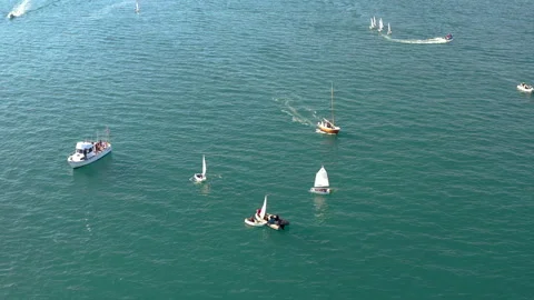 Drone view of Optimist sailboats type in regatta in Alicante bay, Spain. Stock Footage 325830557