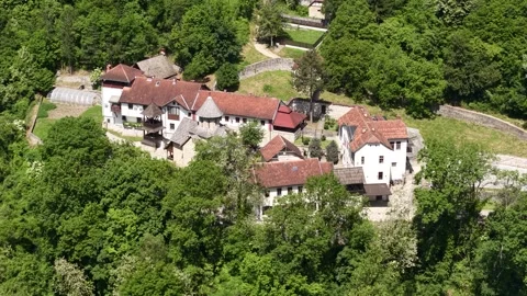 Drone View of Orthodox Monastery in Green Landscape of Ovcar Banja, Serbia on 動画素材 346421794