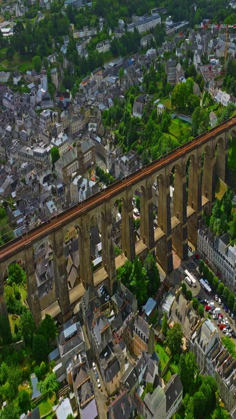 A drone view over bridge Morlaix. Aerial view of the city of Morlaix in Stockbeeldmateriaal 320889131
