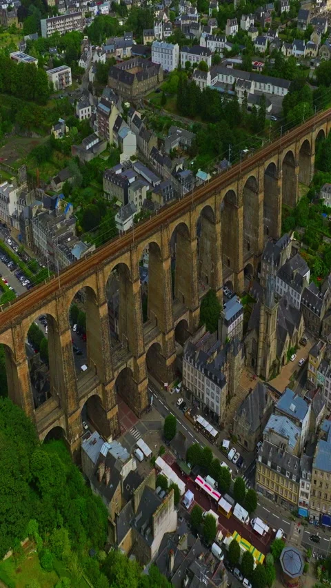 A drone view over bridge Morlaix. Aerial view of the city of Morlaix in Video stock 320891273
