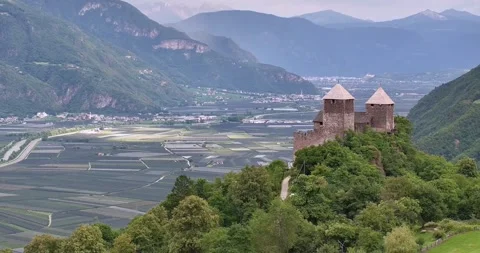 Drone view over Etschtal valley with historic building foreground Video stock 316909856