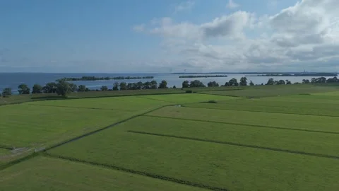 Drone View Over Green Fields Toward Markermeer Stock Footage 339684114