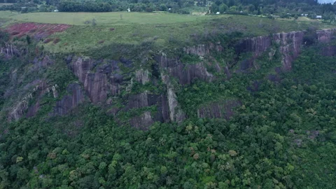 Drone view over green valley to clifftop at Hogsback, South Africa Stock Footage 237218115