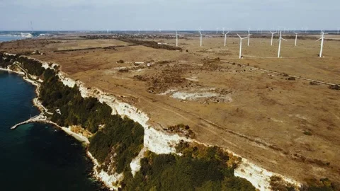 Drone view over Kaliakra Cape and wind turbines in Bulgaria at the Black Sea Stock Footage 219626275