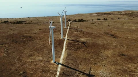Drone view over Kaliakra Cape and wind turbines in Bulgaria at the Black Sea Stock Footage 219626339