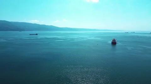 Drone View Over Open Sea and Small Vessel Stock Footage 342344672