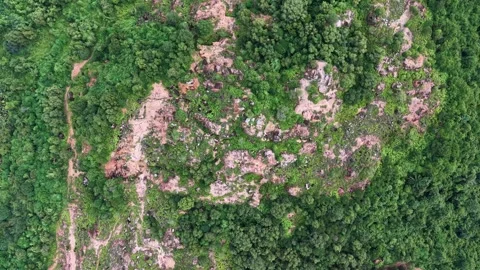 Drone View Over Partially Cleared Mining Hill Vegetation Stock Footage 332246019