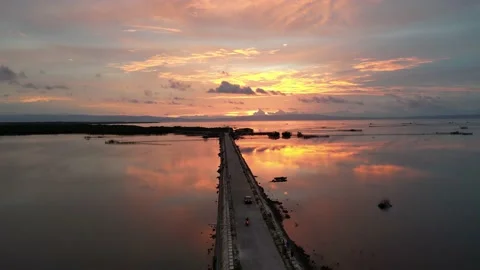 Drone view over a pier at dusk with astonishing twilight sky. Stock Footage 204918318