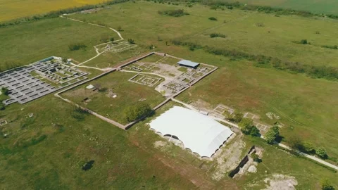 Drone view over Pliska, Bulgaria and the Ruins of The Great Basilica Vídeo Stock 138707153