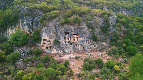 Drone view over Rock tombs of Pinara ancient city in Lycia, Antalya, Turkey	 Stock Footage 231241023