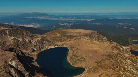 Drone View Over Rocky Terrain and Alpine Lakes Video stock 318426561