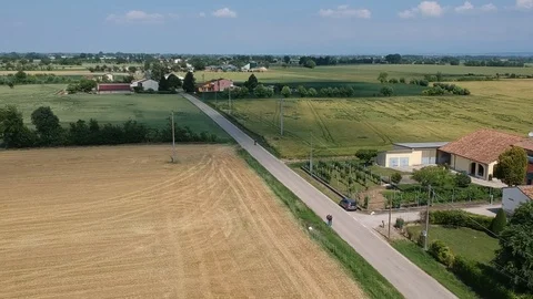 Drone view over some cyclists on the road Stock Footage 112332466