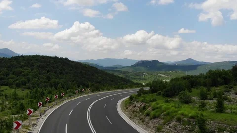 Drone view over some cyclists on the road Stock Footage 112333359