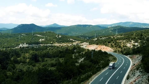 Drone view over some cyclists on the road Stock Footage 112333371