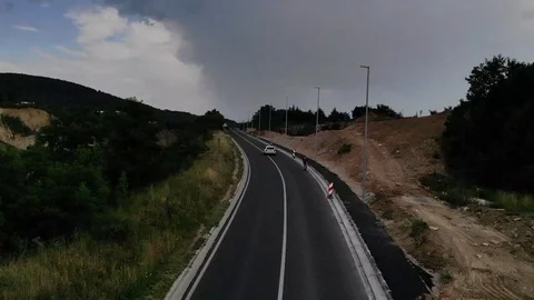 Drone view over some cyclists on the road Stock Footage 112333382