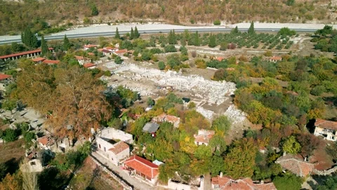 Drone view over Stratonikeia Ancient City in Eskihisar, Mugla, Turkey.	 Stock Footage 231245139