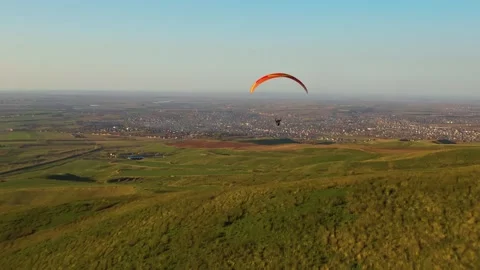 Drone view of paraglider flying over scenic steppe landscape 스톡 동영상 308651819