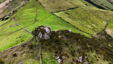 Drone View Of Patchwork Farmland And Rocky Outcrop On Flores Island Azores 動画素材 337698597