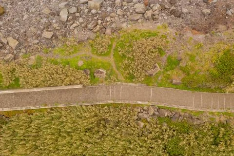 Drone view of path near ocean Stock Photos