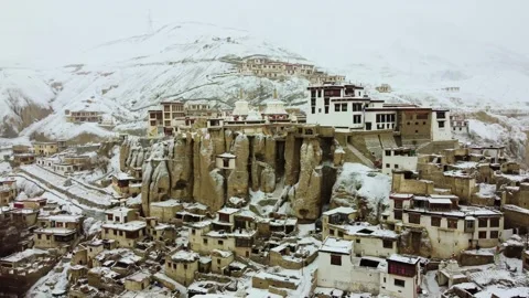 Drone view of peaceful snowfall over the sacred Lamayuru Monastery. Stock Footage 310661227