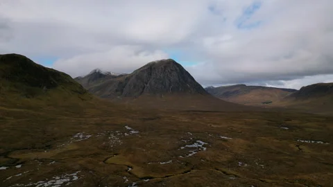 Drone view of peat bog restoration at Black Mount with Buachaille Etive Mor Stock Footage 330528059