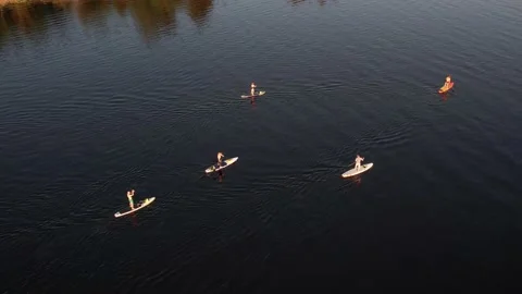 Drone view of people kayaking during summer holidays at sunset Stock Footage 199805722