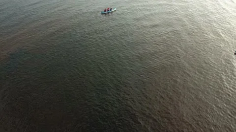 Drone view of people kayaking during summer holidays at sunset Stock Footage 200102918