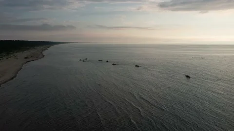 Drone view of people kayaking during summer holidays at sunset Stock Footage 200103444