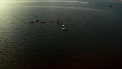 Drone view of people kayaking during summer holidays at sunset Stock Footage 200103507
