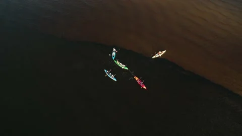 Drone view of people kayaking during summer holidays at sunset Stock Footage 200103643