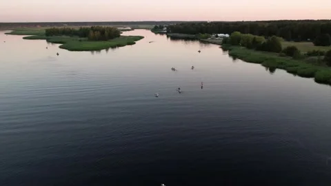 Drone view of people kayaking during summer holidays at sunset Stock Footage 200103770