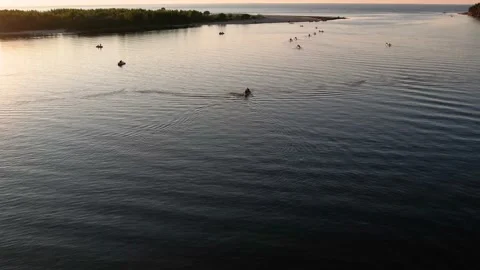 Drone view of people kayaking during summer holidays at sunset Stock Footage 200103880