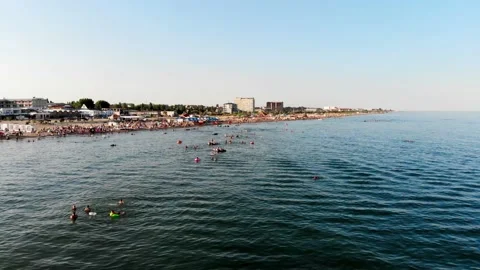 Drone view of people sunbathing on the beach near the sea in Odessa Stock Footage 169092536